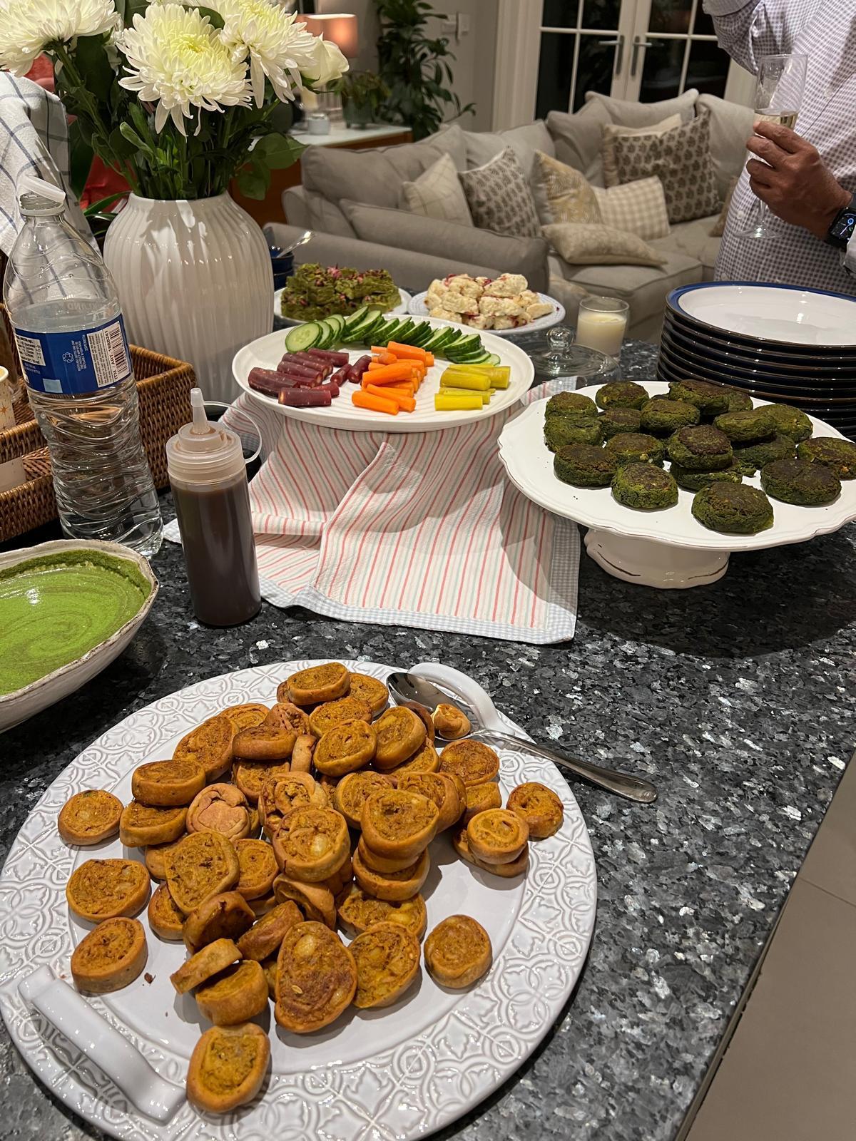 Organized pantry shelves with jars, baskets, and labels