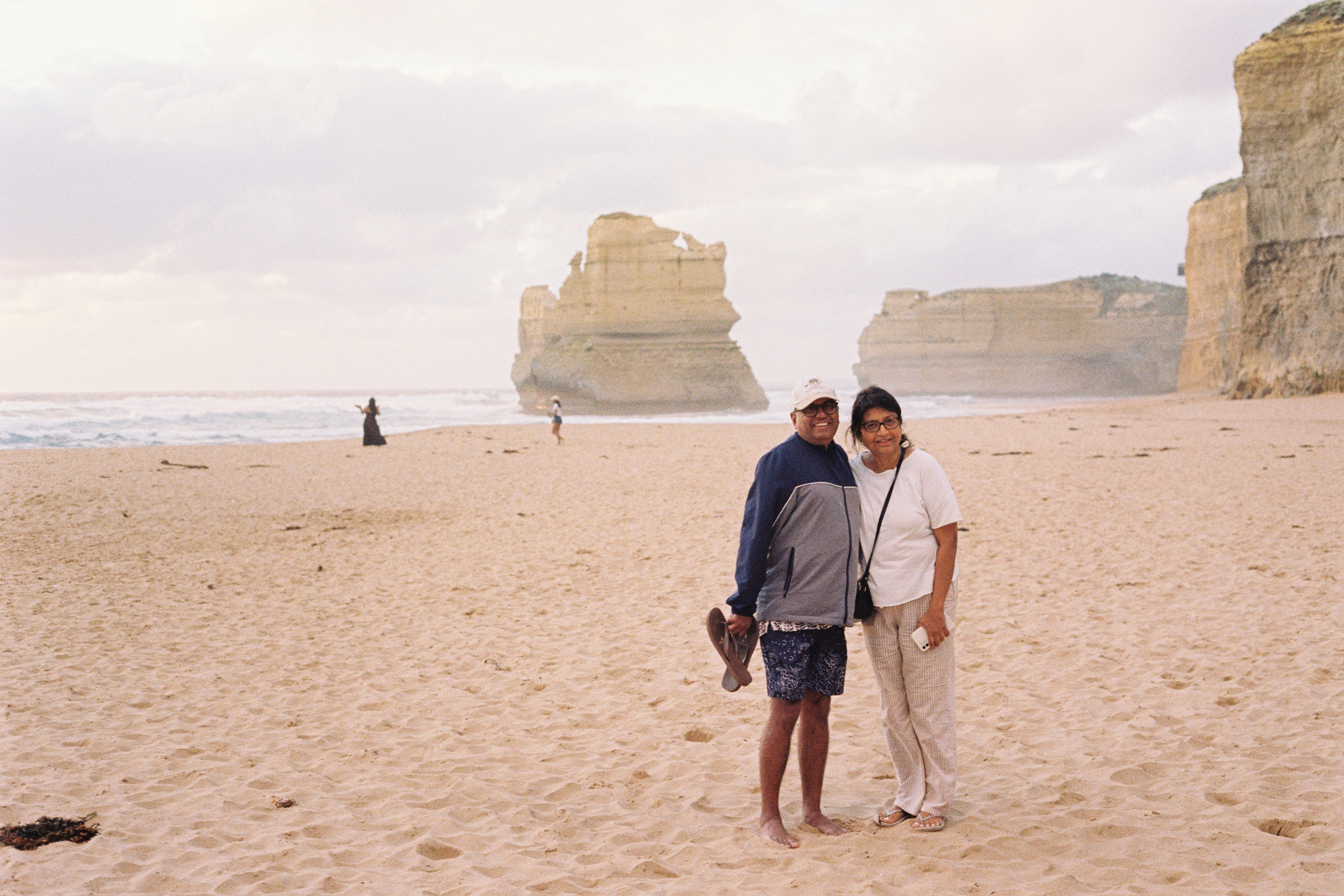Labeled containers in a tidy linen cupboard